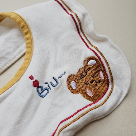 White and Yellow Bibs with Cute Embroidered Designs - Picture 4 of 10